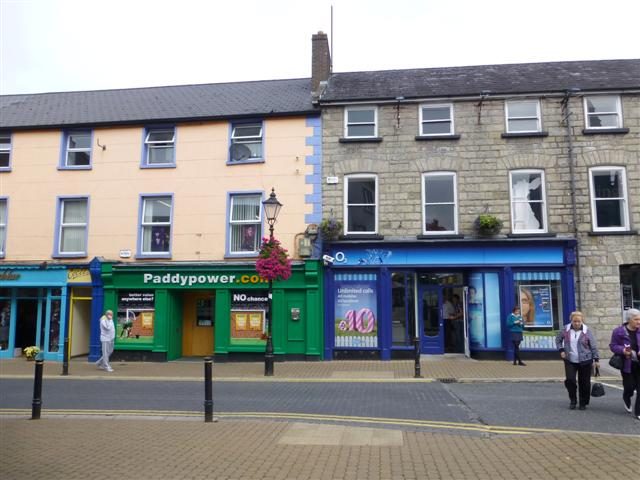 A Paddy Power betting shop storefront on a street