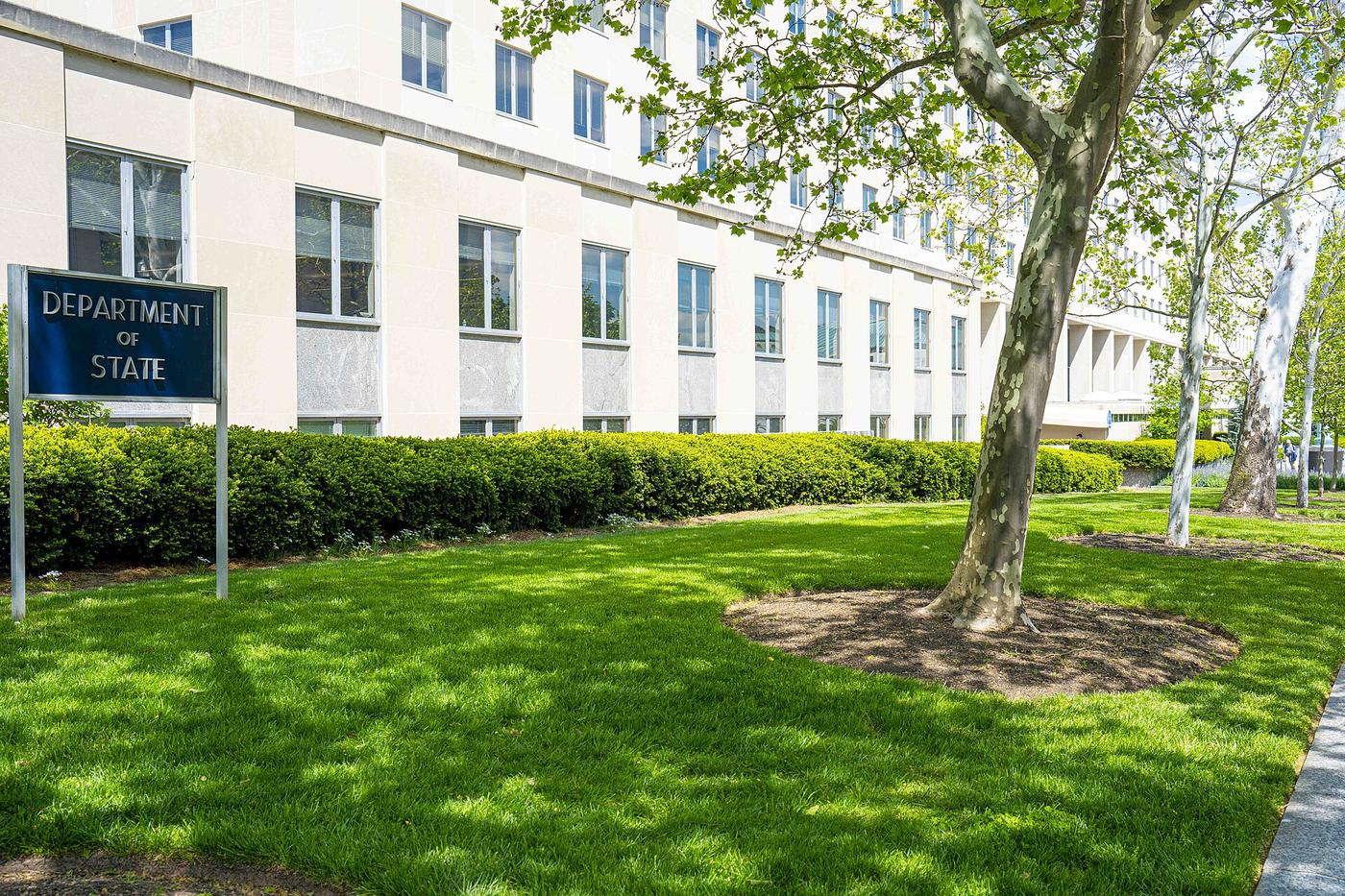 The State Department's Harry S Truman Building in Washington, with a sign out front