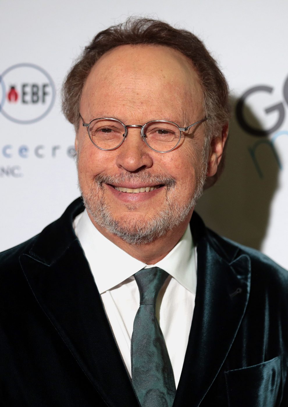 Billy Crystal speaking at an event