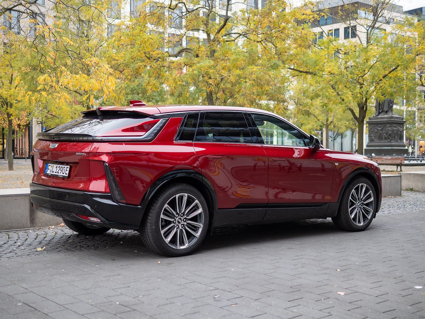 A Cadillac Lyriq electric SUV on display at an auto show