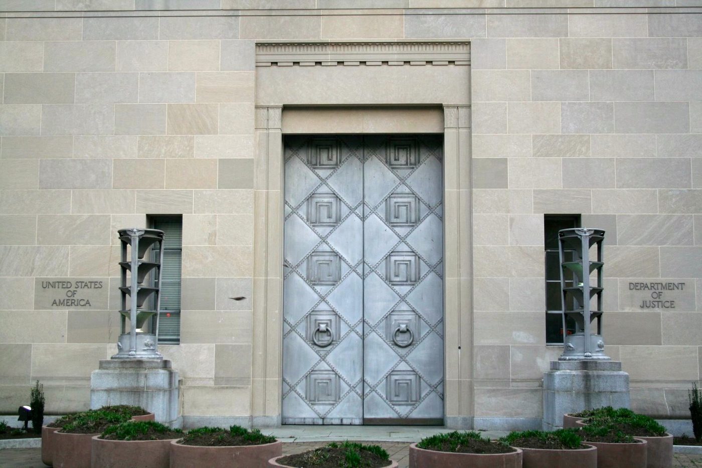 Ornate metal entrance doors of the Robert F. Kennedy Department of Justice Building