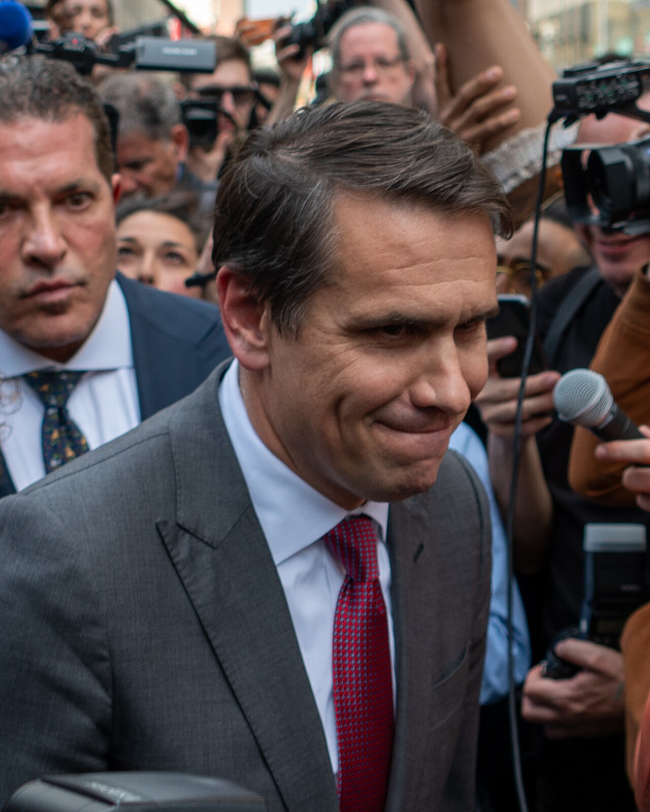 Todd Blanche, a man in a dark suit, outside a courthouse in Manhattan