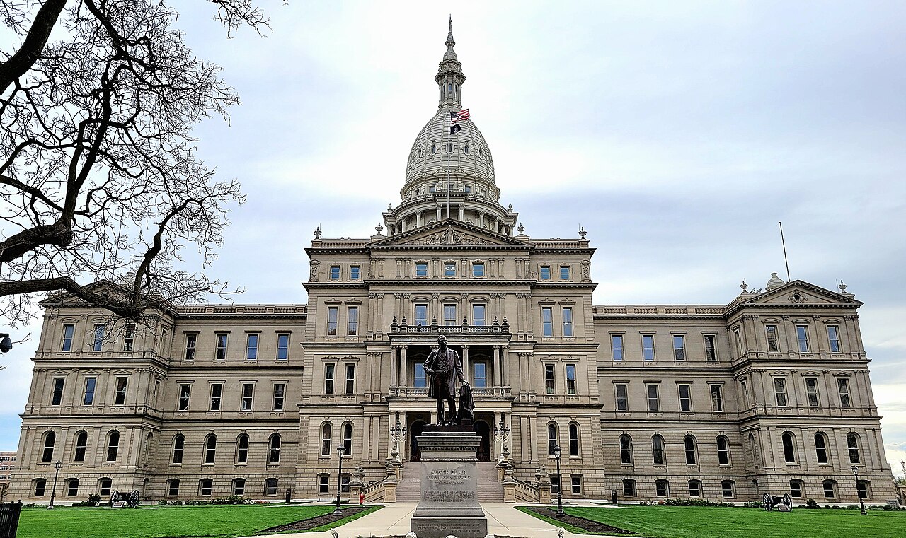 The Michigan State Capitol building with its white dome in Lansing