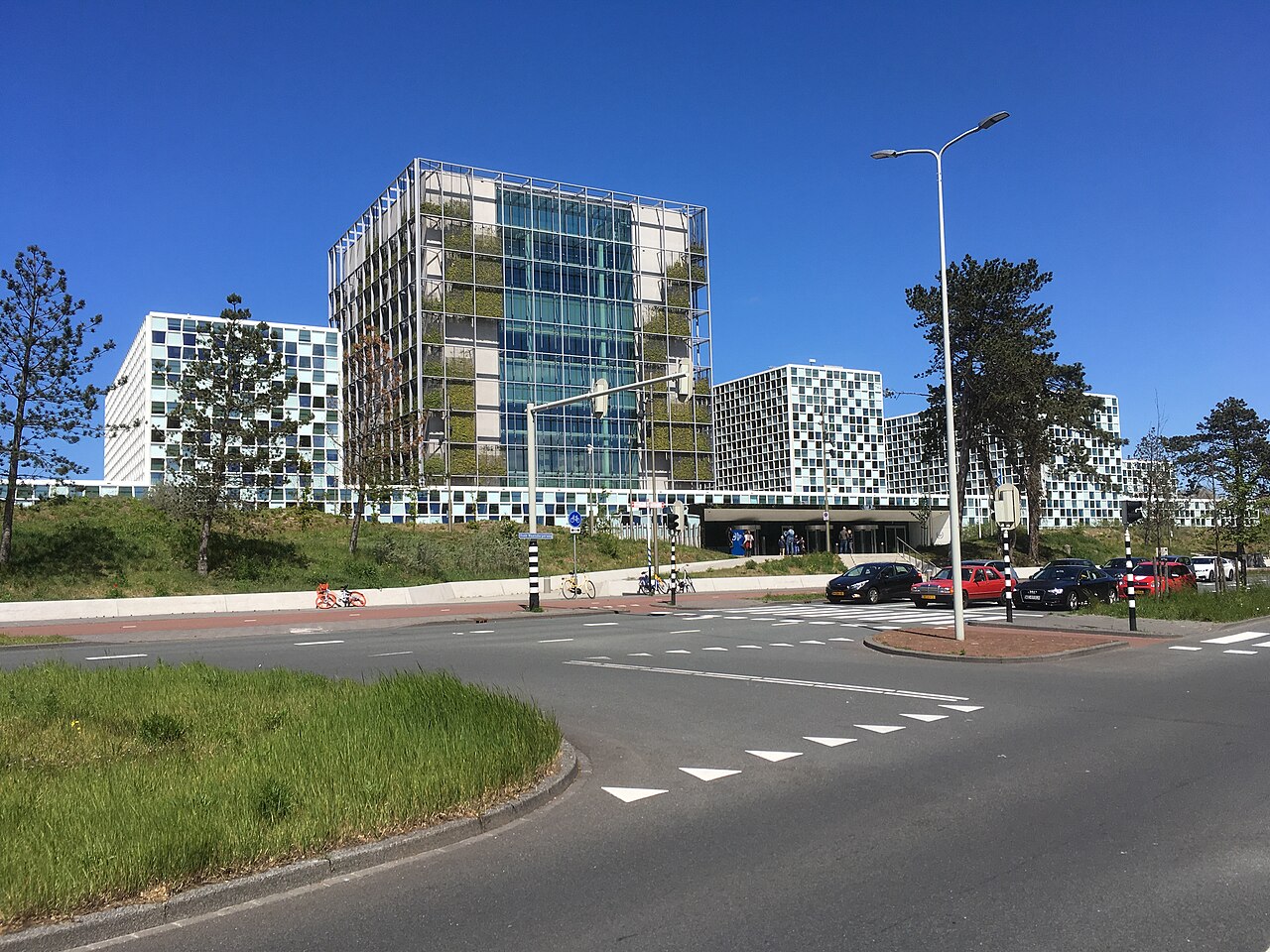 The modern glass and stone buildings of the International Criminal Court