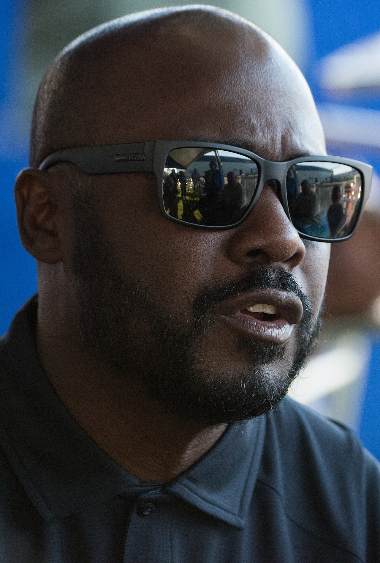 Marshall Faulk smiling at an event in 2017