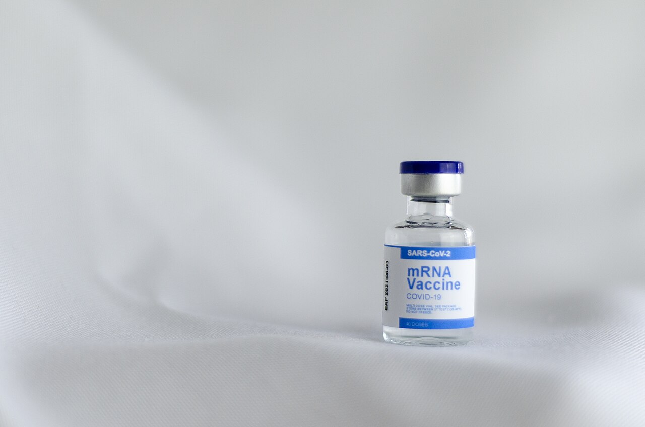 A prop vaccine vial labeled mRNA