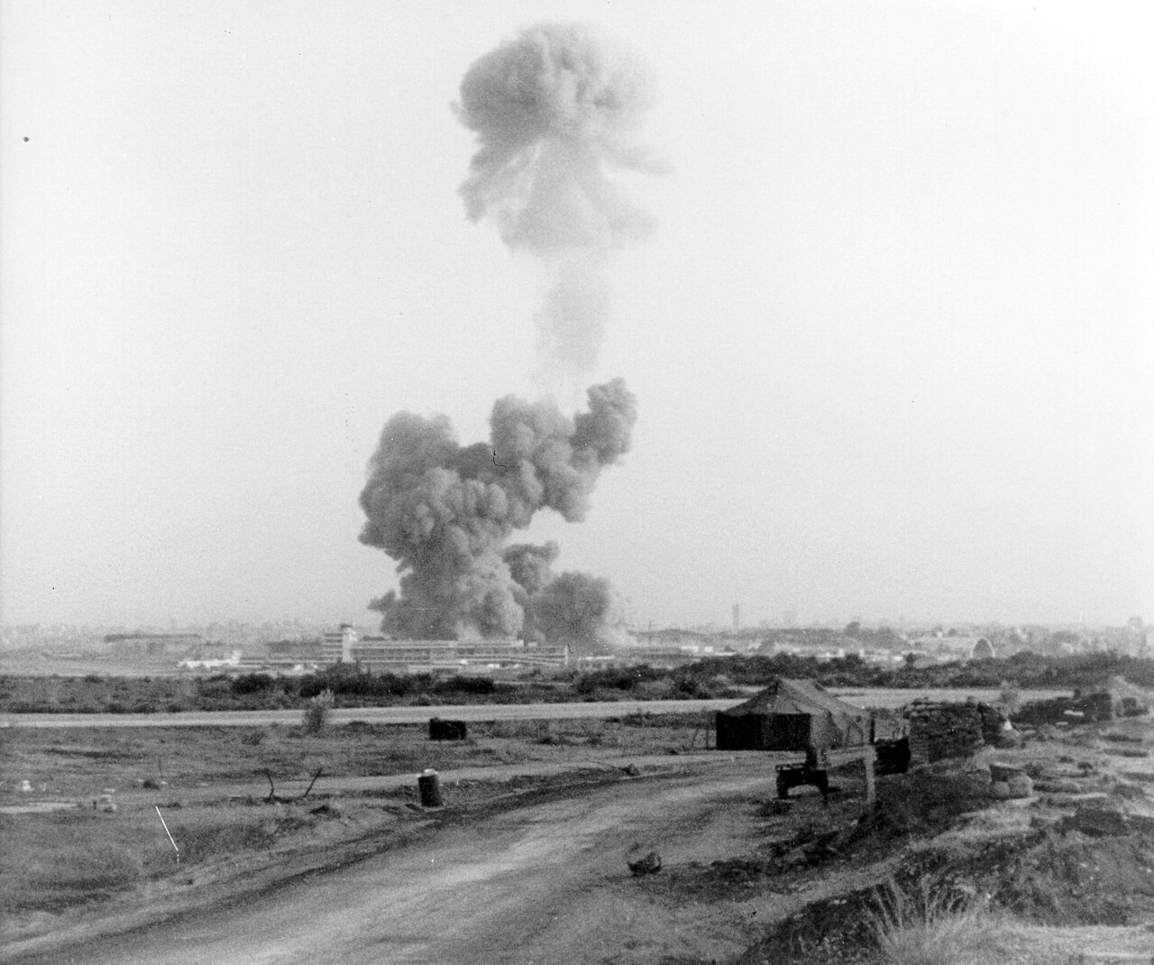 A large cloud of smoke rising over Beirut after the 1983 barracks bombing