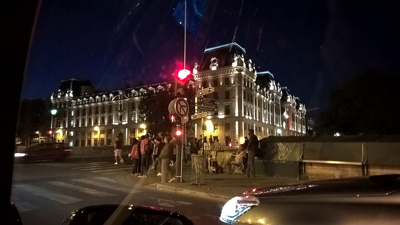 The Paris police headquarters building lit up at night