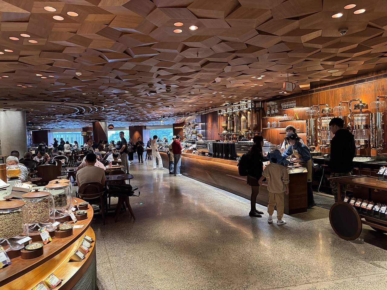 The interior of a large Starbucks Reserve Roastery cafe in Shanghai