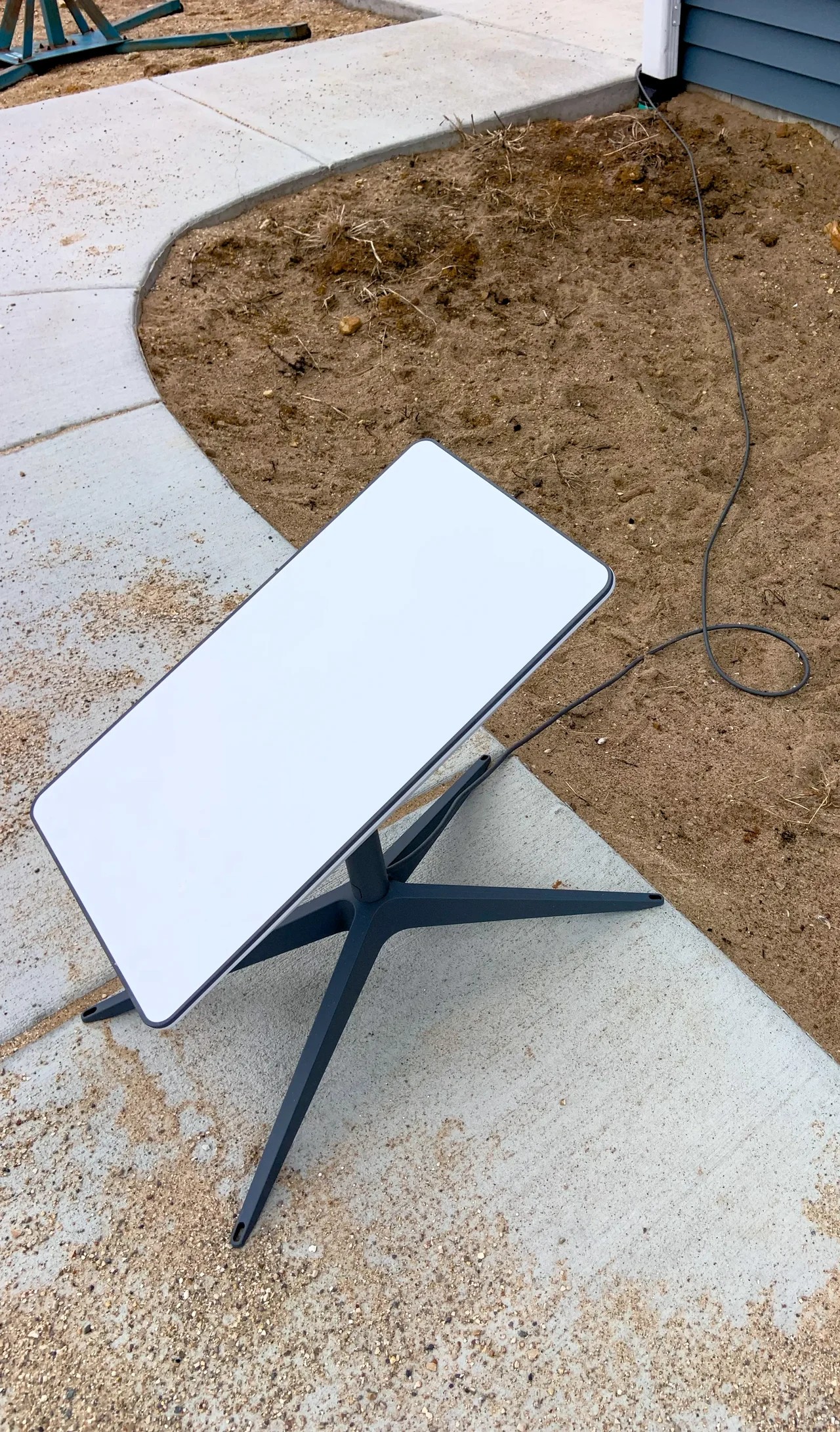 A Starlink satellite dish on the ground