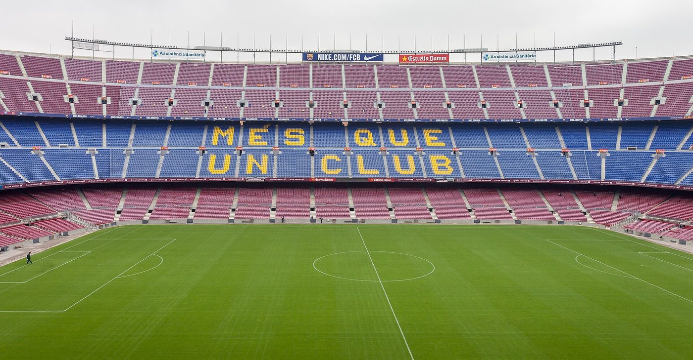 Camp Nou stadium exterior with Més que un club lettering