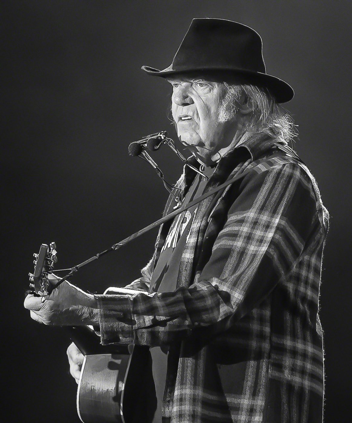 Neil Young performing on stage