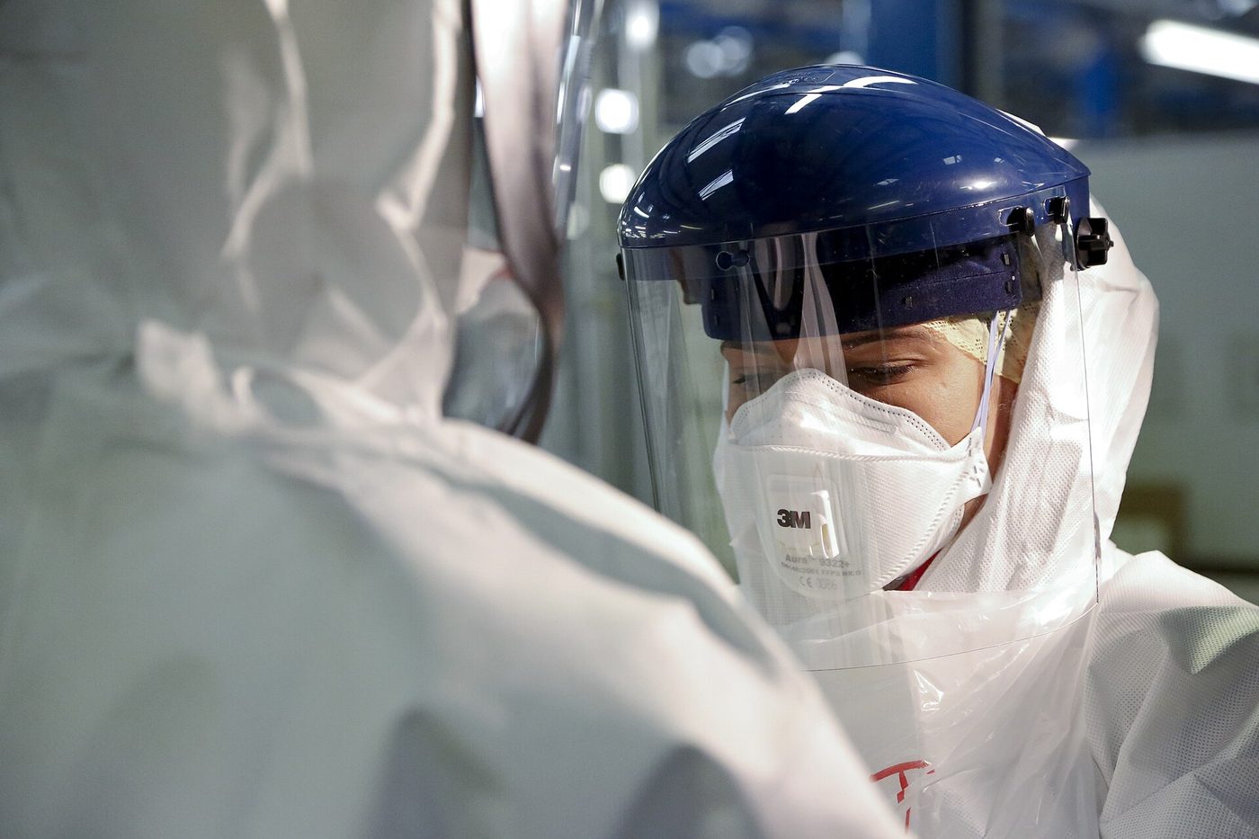 Health worker checking personal protective equipment