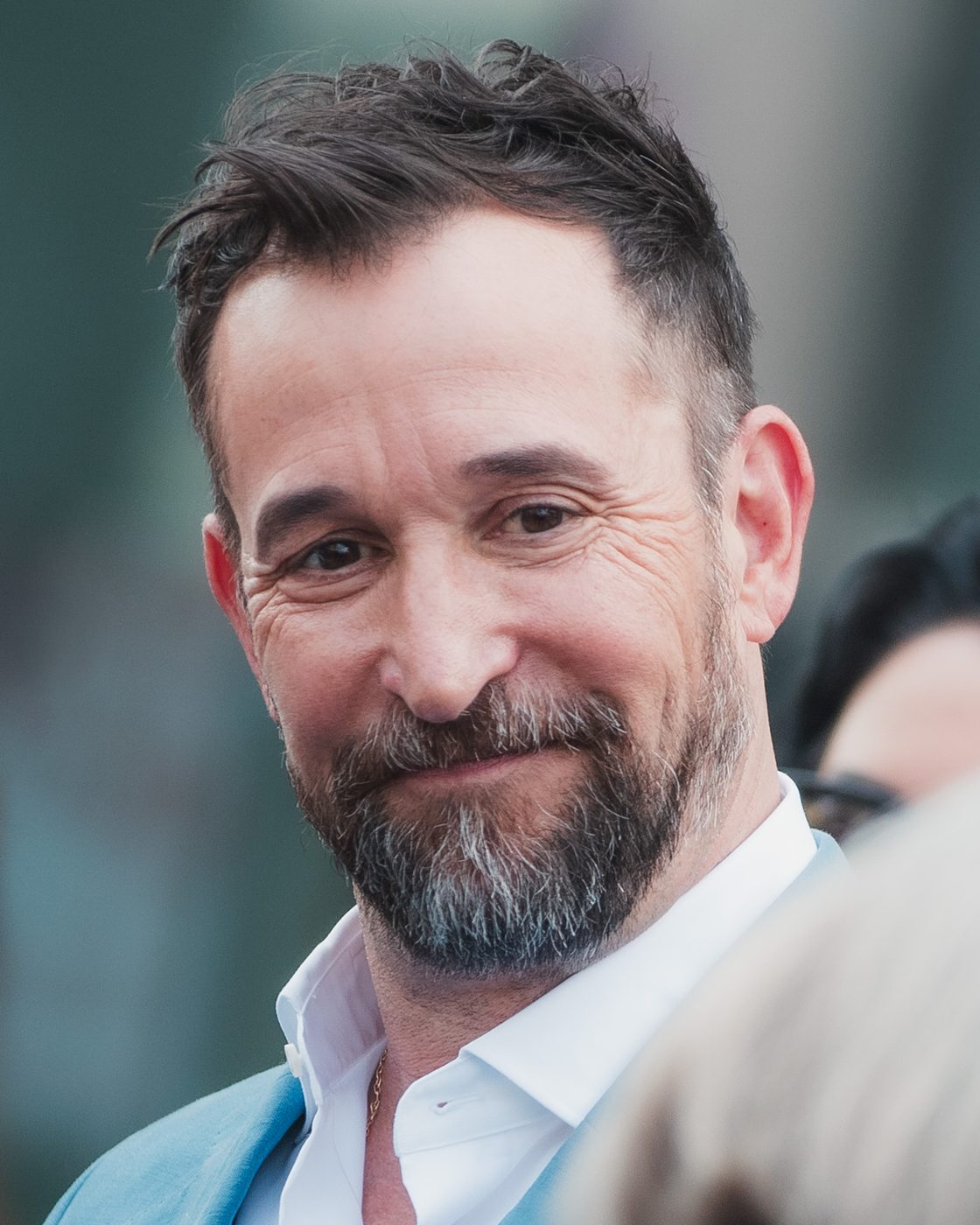 Noah Wyle smiling at his Hollywood Walk of Fame ceremony