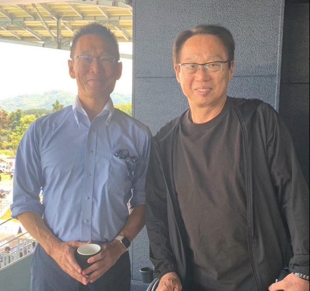 Takeshi Okada, right, with Takanobu Sugiura in 2024
