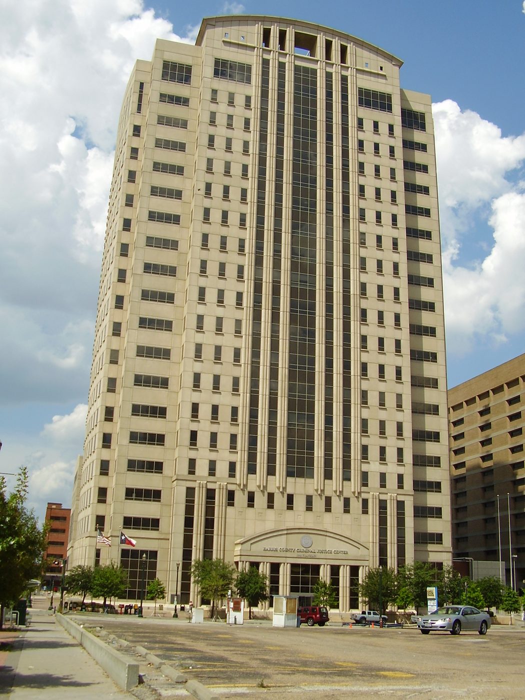 The tall Harris County Criminal Justice Center building in Houston