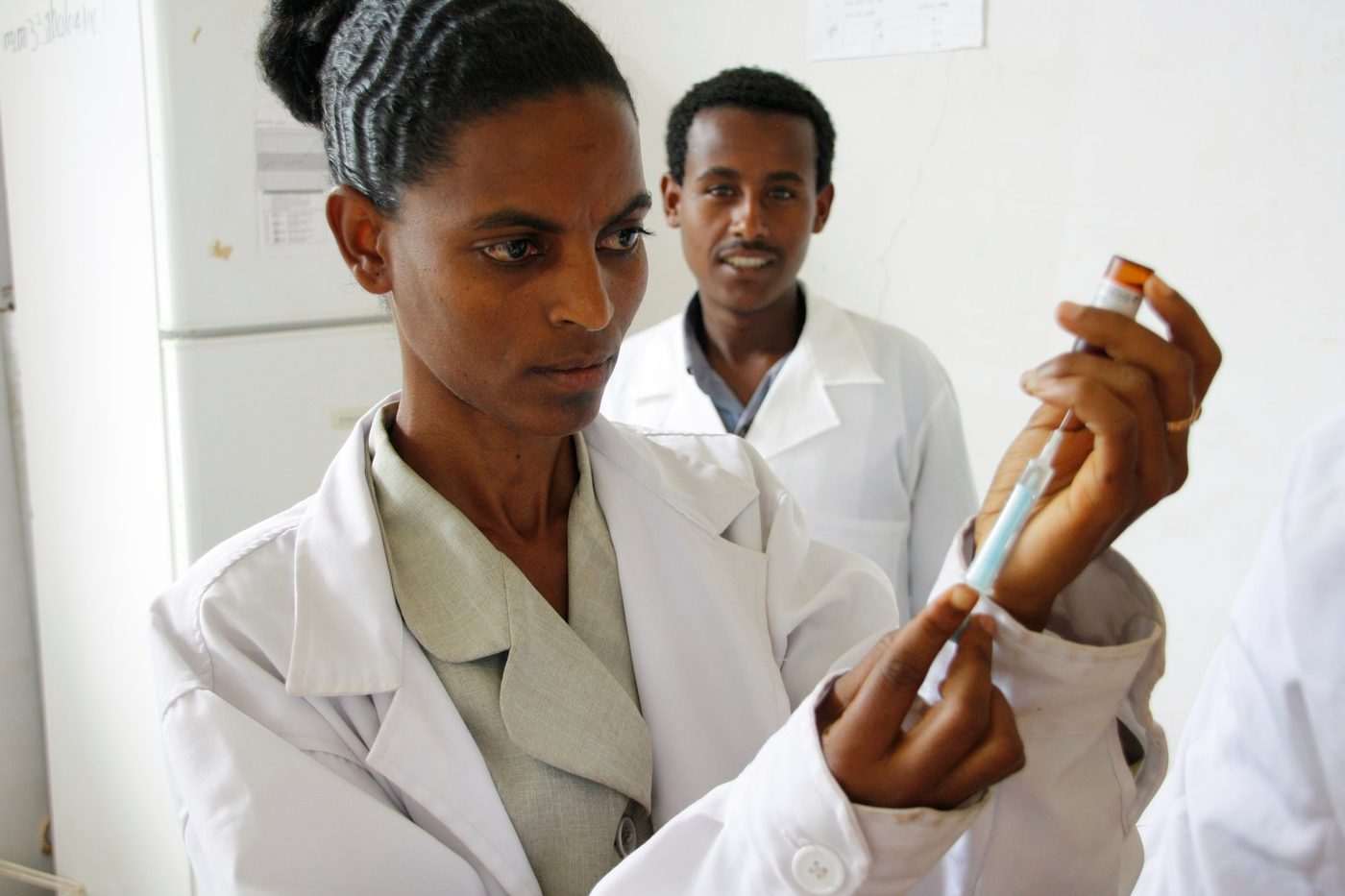 A nurse prepares a measles vaccine at a health centre
