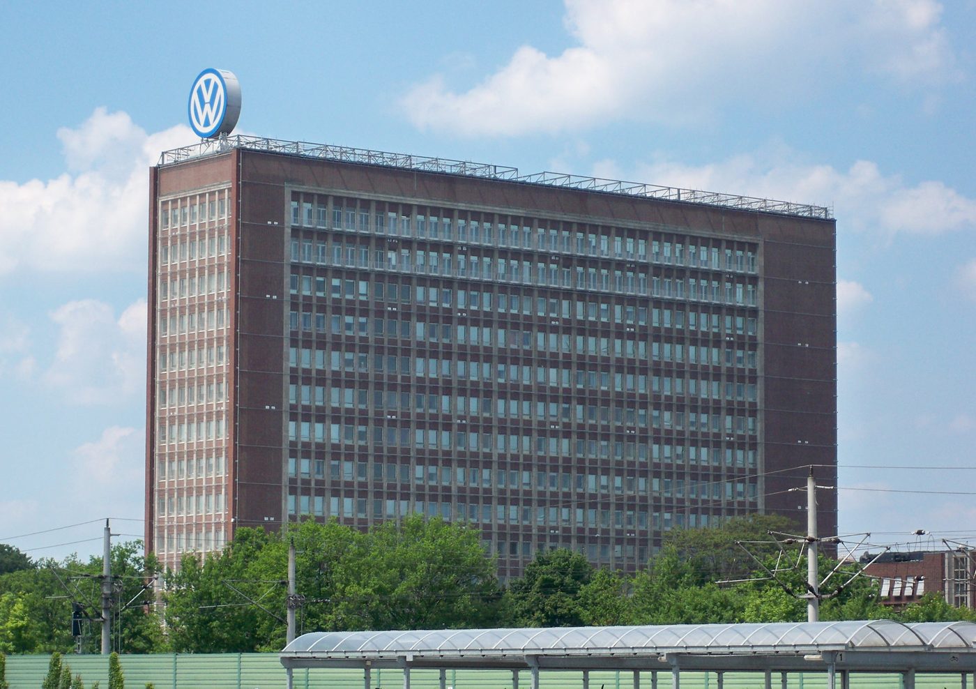 The Volkswagen headquarters tower in Wolfsburg, Germany, with the VW logo on its roof