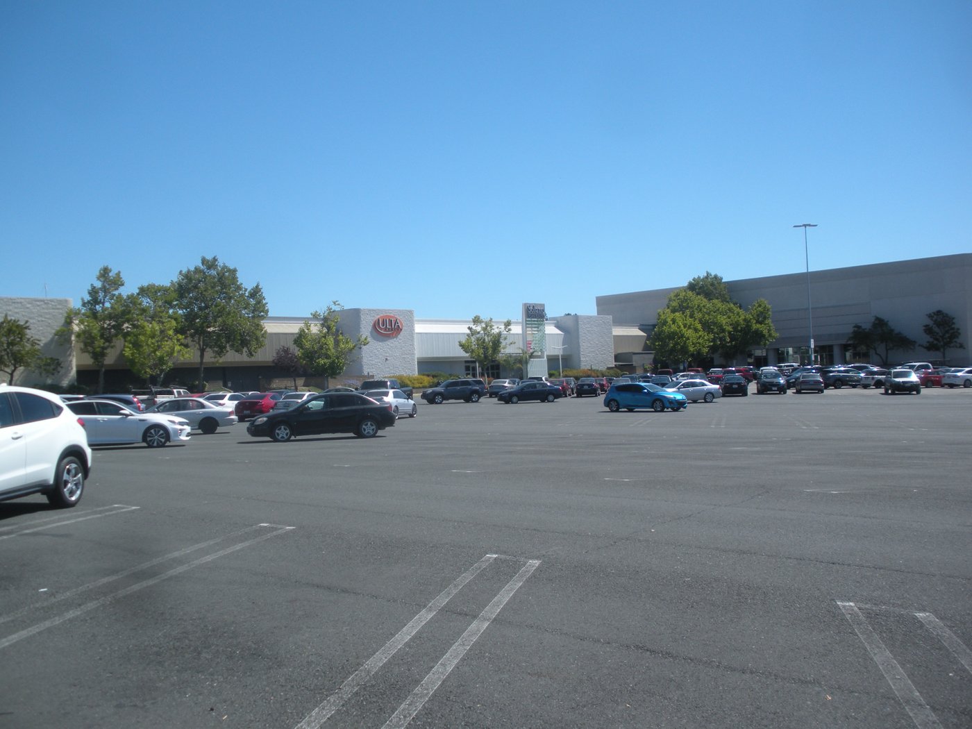 A wide parking lot in front of the Solano Town Center mall in Fairfield, California