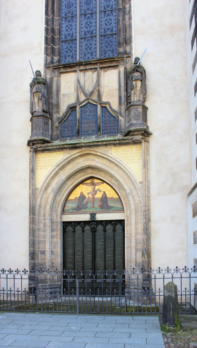 The Theses Door of the Castle Church in Wittenberg, Germany, set in a stone Gothic doorway